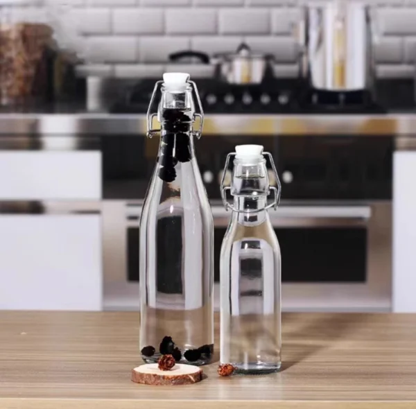 750ml clear glass bottle for beverage with swing top cap - Image 2