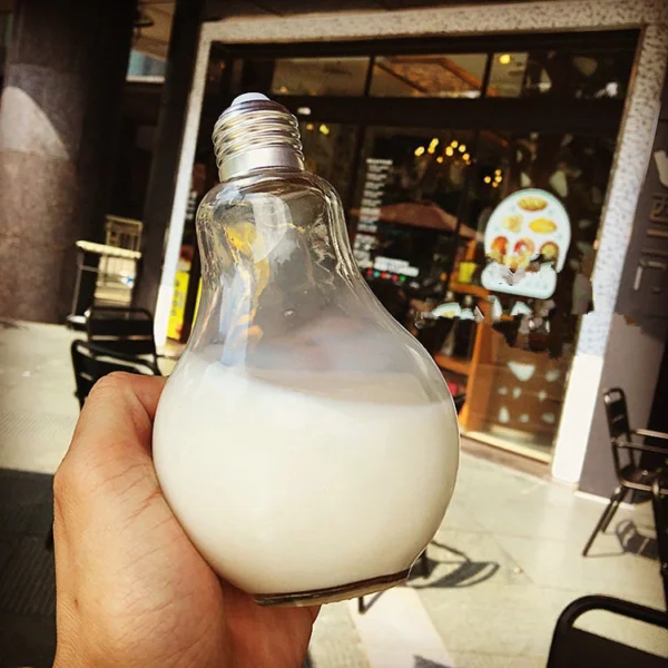 Customized light bulb shaped transparent drinking juice glass bottle - Image 4