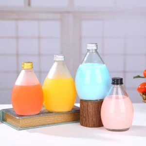 Wholesale 500ml transparent juice bottle water drop shape