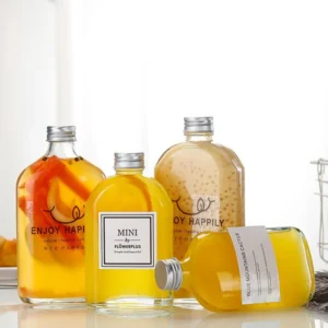 Custom 500ml clear glass juice bottle with lid